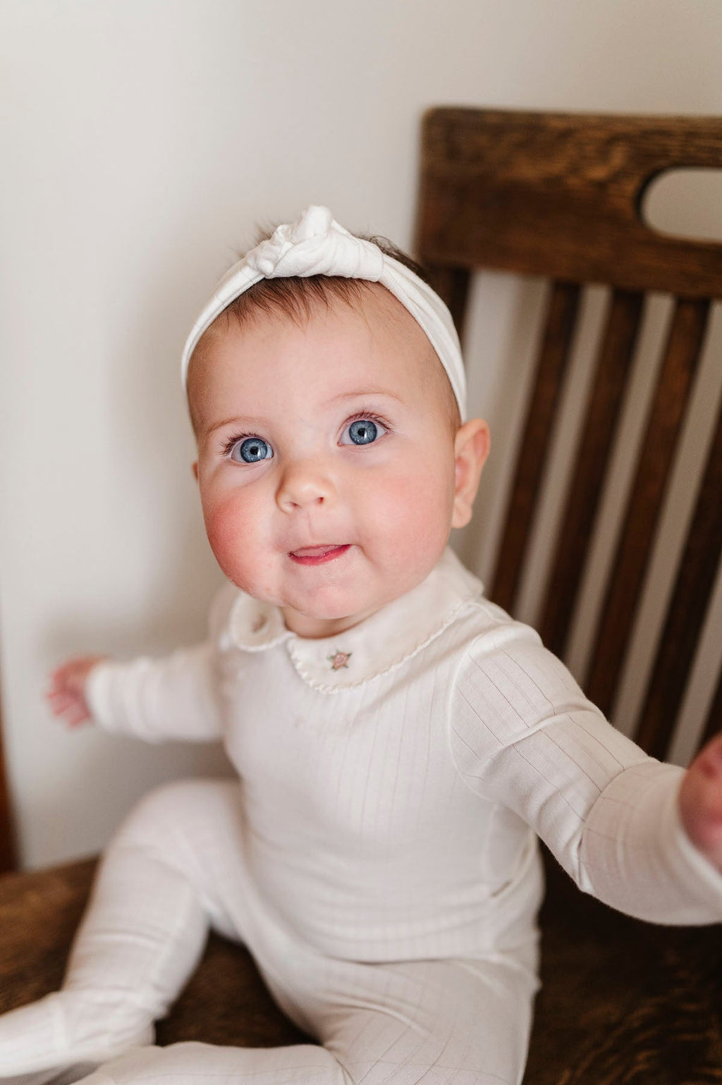 Bandeau côtelé en coton avec rosettes